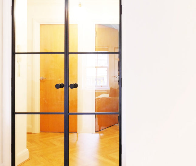 metal door with knobs in a warm environment